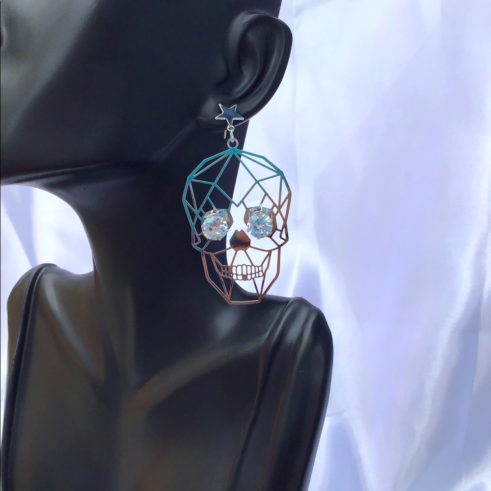 Silver diamond skull earrings